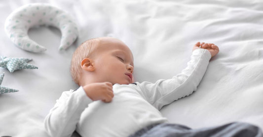 Toddler Sleeping on Bed